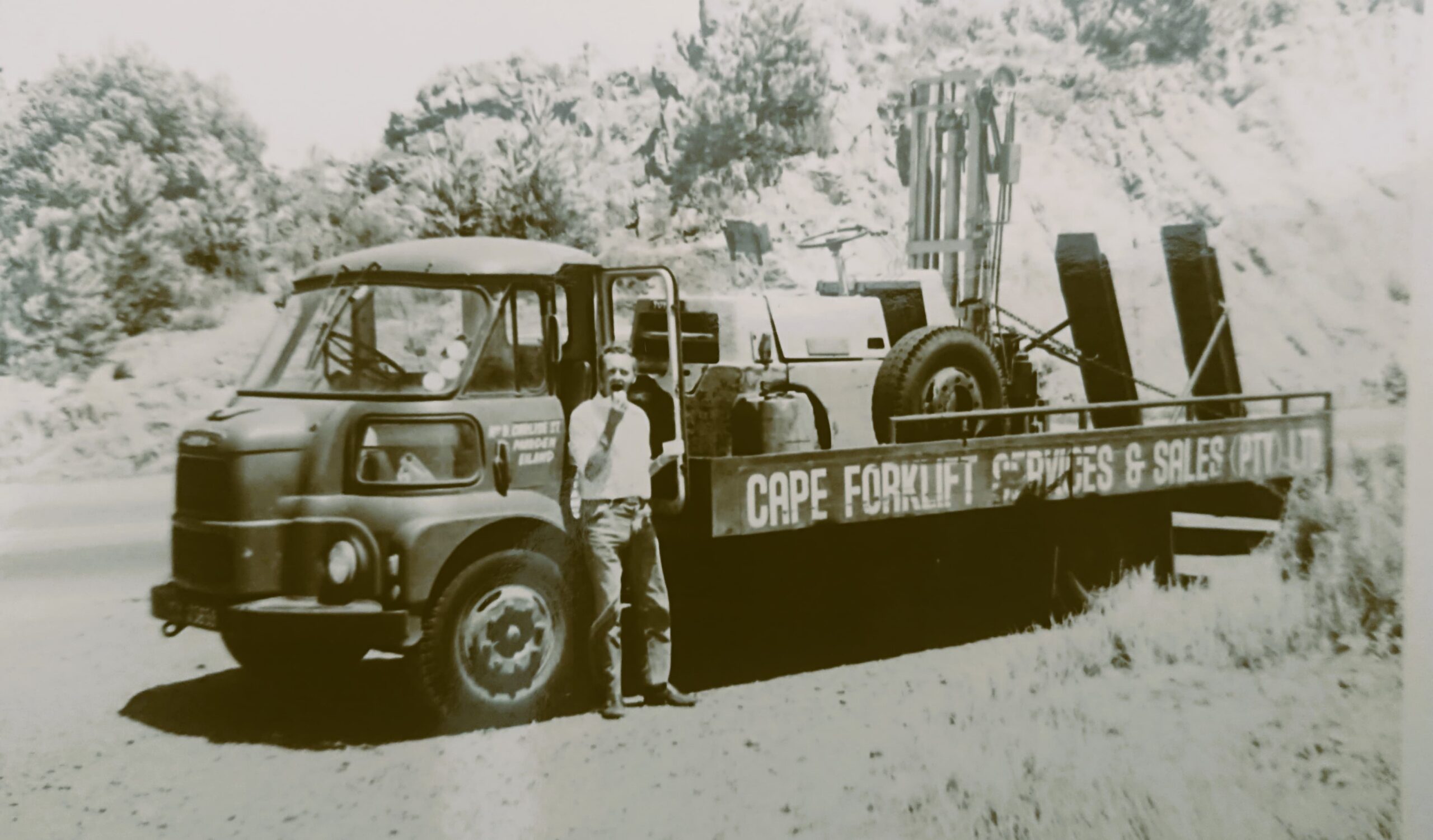 Archive photo of the original Cape Forklift Services & Sales flatbed truck and founder, Cape Town, 1961